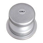 Enceinte magnétique fixant un téléphone sur bureau pour une conférence vidéos claire et mains libres